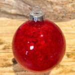 Χριστουγεννιάτικη Γυάλινη Μπάλα Διάφανη Κόκκινες Πούλιες Γκλίτερ 8εκ